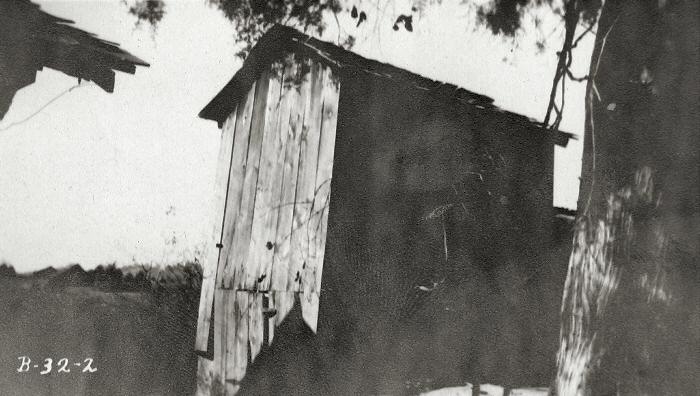 Old wooden outdoor smoke house